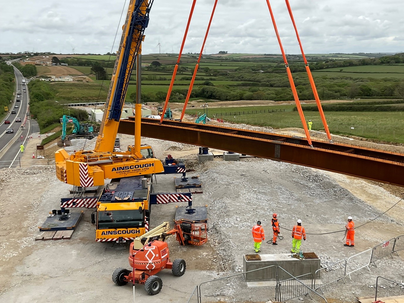 Bridge beams being lifted into place last year for the new bridge at Tolgroggan